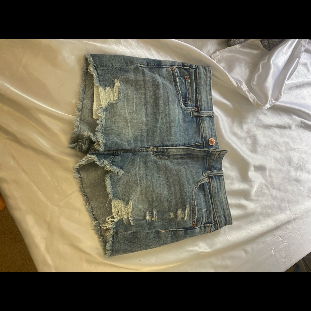 Blue ripped jean shorts